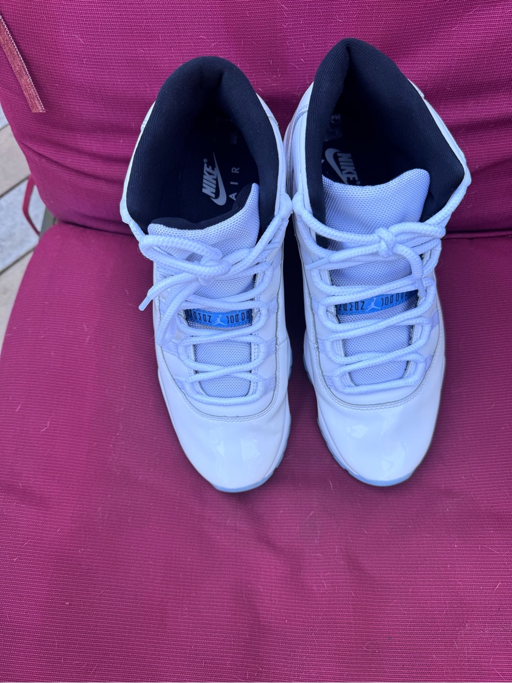 Jordan Men's White Sneakers with Black Lining and Blue Tongue Detail
